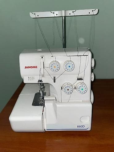 mac: Швейная машина Janome, Оверлок, Полуавтомат — 1