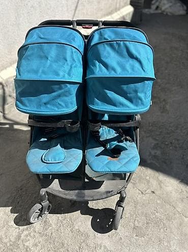 Двухместная прогулочная коляска для двойни/погодок (расположение