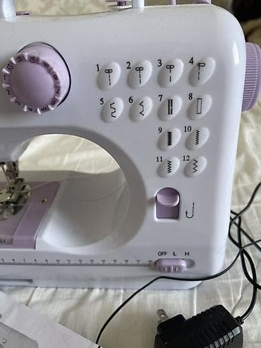 Климатическая техника: Компактная швейная машина с педалью Описание: - Настольная — 2