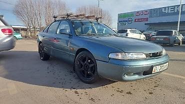 аудио системы: Mazda 626: 1995 г., Механика, Седан — 6