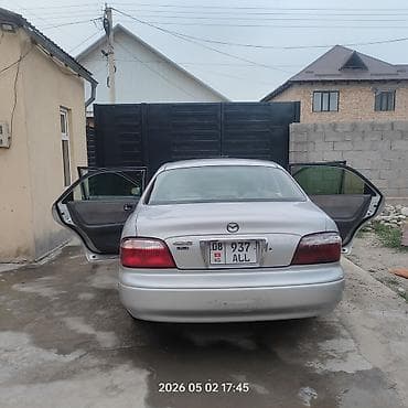 mazda 121: Mazda 626: 2001 г., 2 л, Автомат, Седан — 7