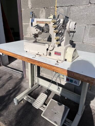 Швейная машина Распошивальная машина