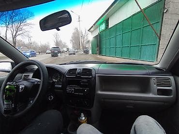 новое авто: Mazda Demio: 2002 г., 1.3 л, Механика, Бензин, Хэтчбэк — 9