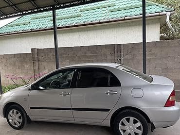 Унаа: Toyota Corolla: 2003 г., 1.4 л, Кол менен иштөөчү, Бензин, Седан — 2