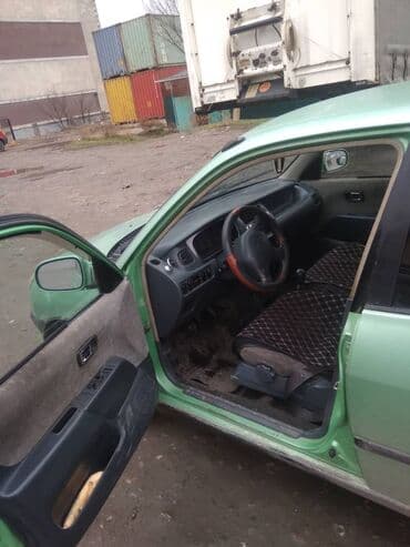кизил кия: Daihatsu Sirion: 2001 г., 1 л, Механика, Бензин, Хэтчбэк — 6