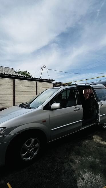 Транспорт: Mazda : 2003 г., Кол менен иштөөчү, Бензин — 6