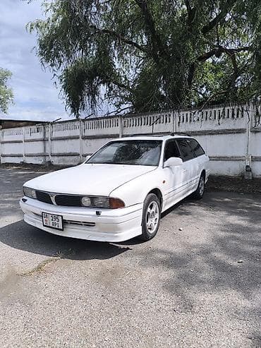 Mitsubishi Sigma/Magna: 1993 г., 3 л, Механика, Бензин, Универсал — 10