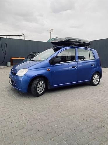 алмашаи: Daihatsu Cuore: 2004 г., 1 л, Механика, Бензин, Хэтчбэк — 4