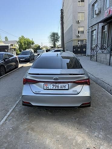 тайота арио: Toyota Avalon: 2021 г., 2.5 л, Автомат, Гибрид, Седан — 5