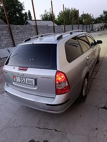 шеврале эпика: Chevrolet Lacetti: 2012 г., 1.6 л, Механика, Бензин, Универсал — 4