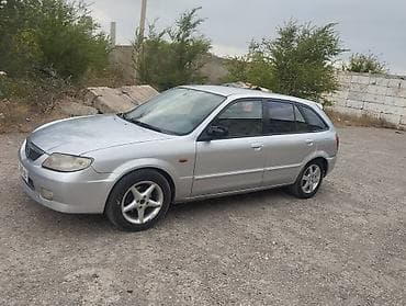 рейка на 210: Mazda 323: 2003 г., 1.5 л, Механика, Универсал — 10