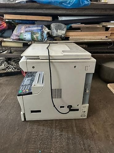 Принтеры и МФУ: МФУ Kyocera KM-1635 — монохромное устройство «3-в-1» для офиса: - — 2
