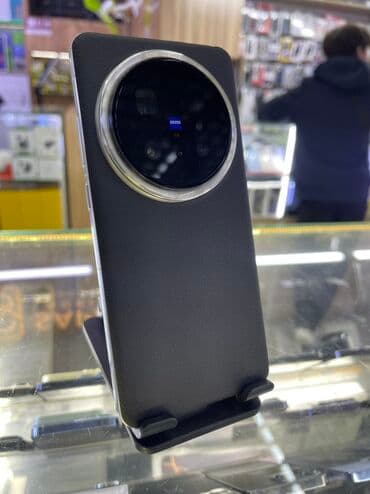 кант телефоны: Смартфон с камерой ZEISS ViVo X200 Pro - Тыльный блок камер: крупный — 2