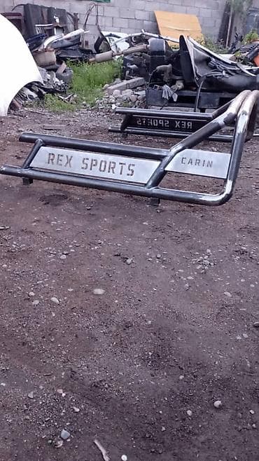 x rider: Спортивная дуга в кузов пикапа REX SPORTS (надпись REX SPORTS / CARIN) — 2