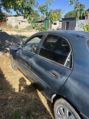 Унаа: Daewoo Lanos: 1997 г., 1.5 л, Кол менен иштөөчү, Бензин, Седан — 1