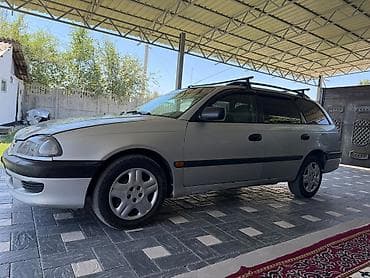 Toyota Avensis: 1999 г., 1.8 л, Механика, Бензин, Универсал — 1
