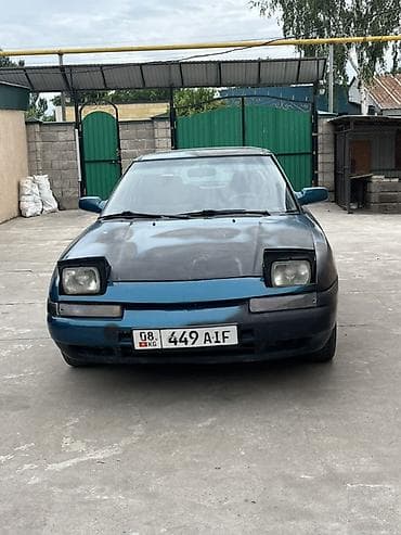 Транспорт: Mazda 323: 1992 г., 1.6 л, Механика, Бензин, Хэтчбэк — 1
