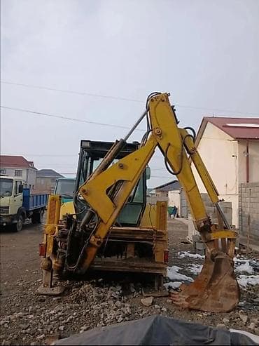 экскаваторы погрузчик: Экскаватор, Caterpillar, Колесный — 3