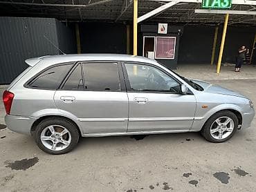 Mazda 323: 2004 г., Хэтчбэк — 6