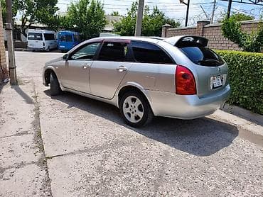 Nissan Primera: 2002 г., 2 л, Автомат, Бензин, Универсал — 4