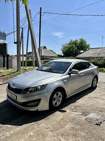 zero x neo: Kia K5: 2010 г., 2 л, Автомат, Газ, Седан — 1