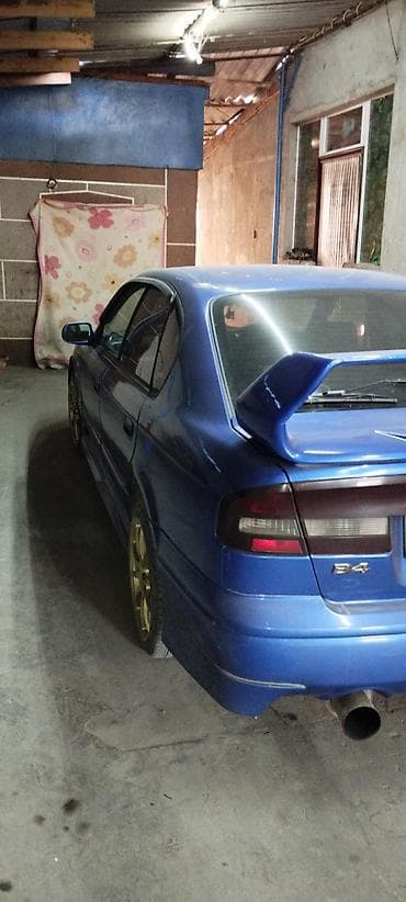 tayota 4ranner: Subaru Legacy: 2002 г. — 2