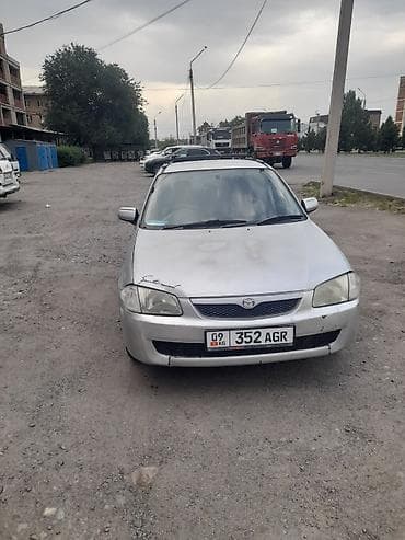 e 303: Mazda 323: 1999 г., 1.5 л, Автомат, Бензин, Универсал — 4