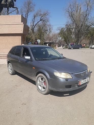mazda 929: Mazda 323: 2003 г., 1.6 л, Механика, Бензин, Универсал — 3