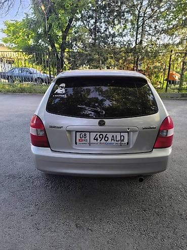 mazda 3: Mazda 323: 2001 г., 1.6 л, Механика, Бензин — 4