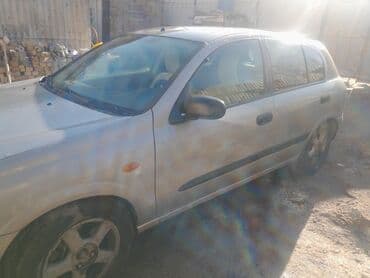 наконечник на глушитель: Nissan Almera: 2003 г., 1.5 л — 5