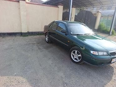 Унаа сатуу: Mazda 626: 1999 г., 1.8 л, Кол менен иштөөчү, Бензин, Седан — 2