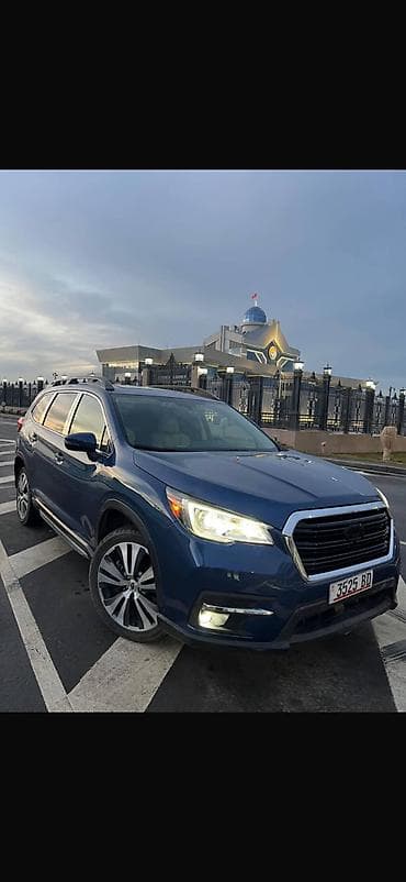 su 7: Просторный 3‑рядный кроссовер синего цвета. Основные особенности: - — 7