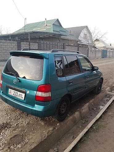 deu labo: Mazda Demio: 1999 г., 1.3 л, Механика, Бензин, Минивэн — 2