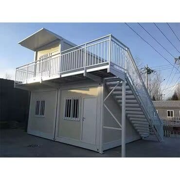 передвижные дома: Двухэтажное модульное здание белого цвета. Конструкция состоит из — 3