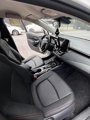 e2 byd: Toyota Corolla: 2019 г., 1.8 л, Вариатор, Гибрид, Седан — 9