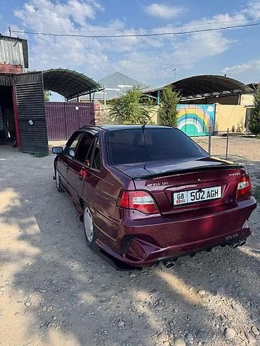 mini cuper: Легковой автомобиль седан, 4 двери, бордовый металлик с черной крышей — 6