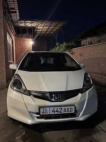 mini ev: Honda Fit: 2012 г., 1.3 л, Вариатор, Гибрид, Хэтчбэк — 1