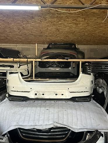 Детали ходовой части: Бампер Cadillac — 1