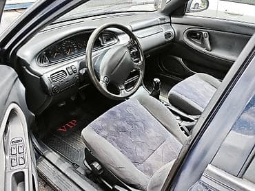 Транспорт: Mazda 626: 1996 г., 2 л, Механика, Бензин, Хэтчбэк — 6