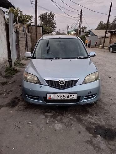 Mazda Demio: 2003 г.