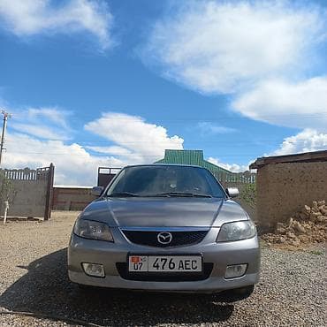 каракол авто: Mazda 323: 2003 г., 1.6 л, Автомат, Хетчбек — 4