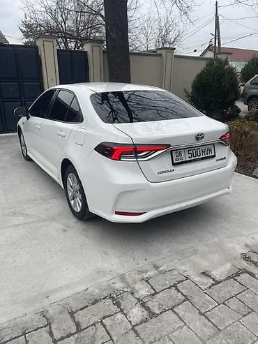тайота карола 120: Toyota Corolla: 2022 г., 1.8 л, Вариатор, Гибрид, Седан — 7