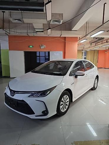 Toyota Corolla: 2021 г., 1.8 л, Вариатор, Гибрид, Седан — 1