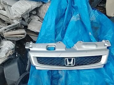 ветровик скутер: Решетка радиатора Honda — 9