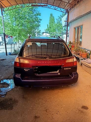 оптики: Subaru Legacy: 1999 г., Универсал — 2