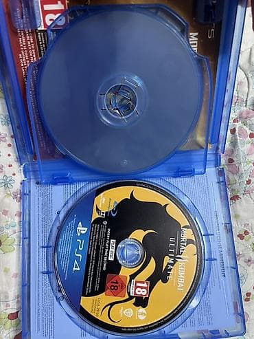 Видеоигры: Mortal Kombat 11 Ultimate — версия для PlayStation 4 (диск Blu‑ray в — 2