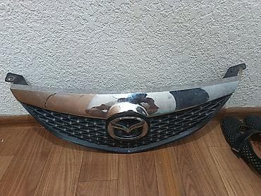 Решетка радиатора Mazda Оригинал at lalafo.kg Решетка радиатора Mazda Оригинал