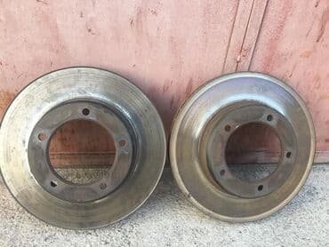 перфорированные тормозные диски: Комплект тормозных дисков Toyota Оригинал — 1