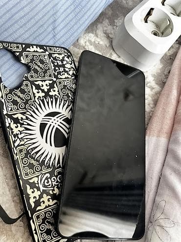 Samsung Galaxy A06, Б/у, 128 ГБ, цвет - Голубой, 2 SIM