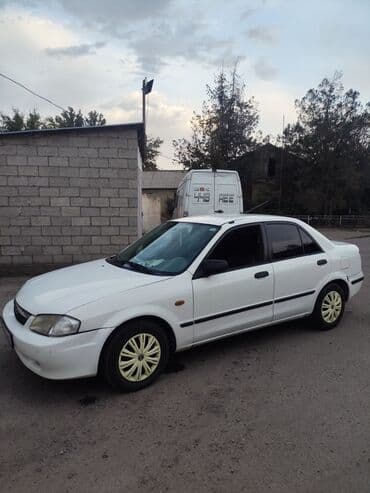 Mazda 323: 2000 г., 1.4 л, Механика, Бензин, Седан